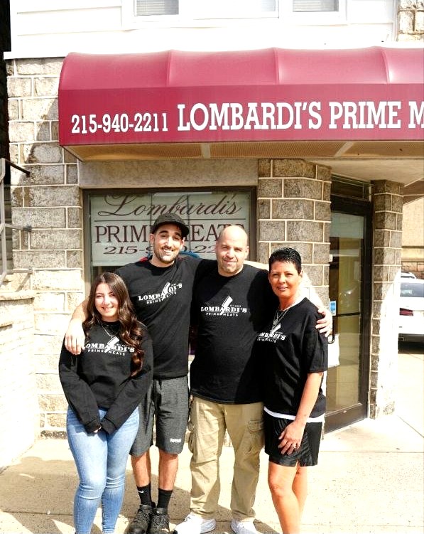 The Lombardi family together outside their South Philadelphia butcher shop on Packer Avenue